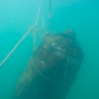 Bagnante trova ordigno sul fondale